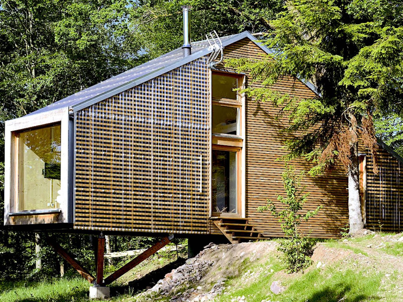 découvrez notre chalet écolo, un havre de paix respectueux de l'environnement, parfait pour une escapade sur mesure. profitez d'un confort moderne en harmonie avec la nature, tout en réduisant votre empreinte écologique.