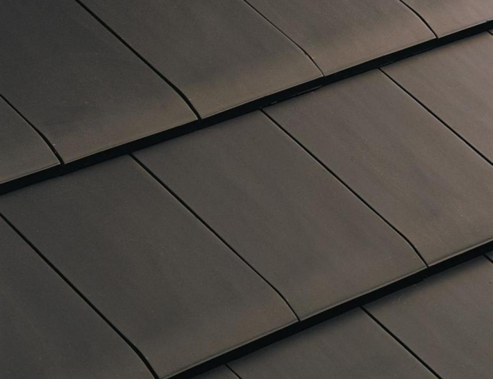 découvrez la tuile volnay, un élégant modèle de couverture en terre cuite alliant tradition et modernité. parfaite pour donner du cachet à votre toiture, elle allie esthétique et performance. idéale pour les projets de construction ou de rénovation, cette tuile assure une excellente résistance aux intempéries tout en offrant une chaleur naturelle à votre habitat.